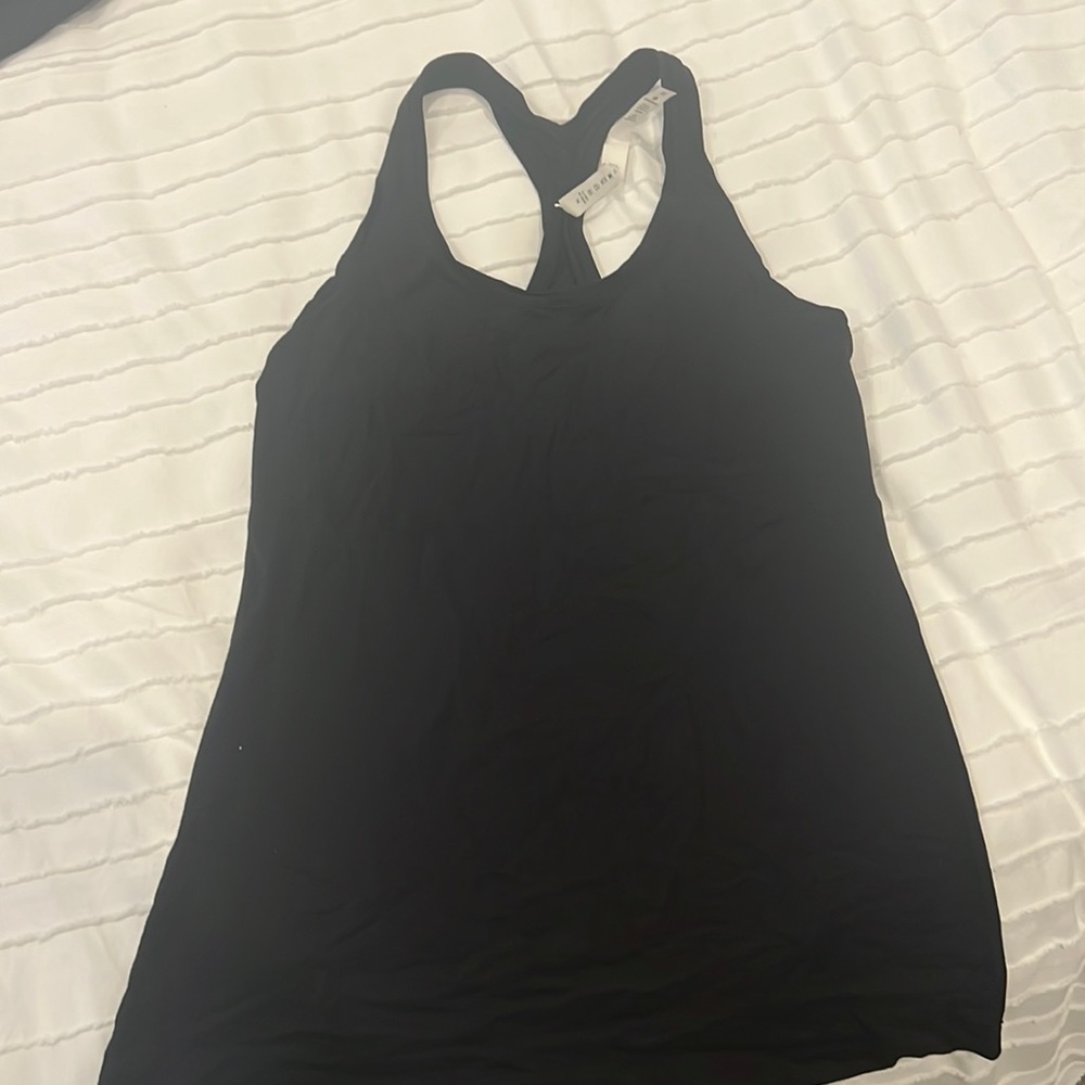 Super comfortable black y tank hardly worn.
